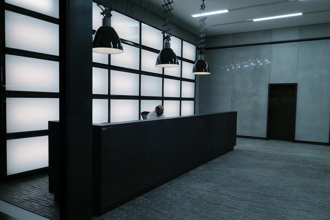 UK small business owner working through 5 call type distribution before buying AI receptionist — 2026 decision framework