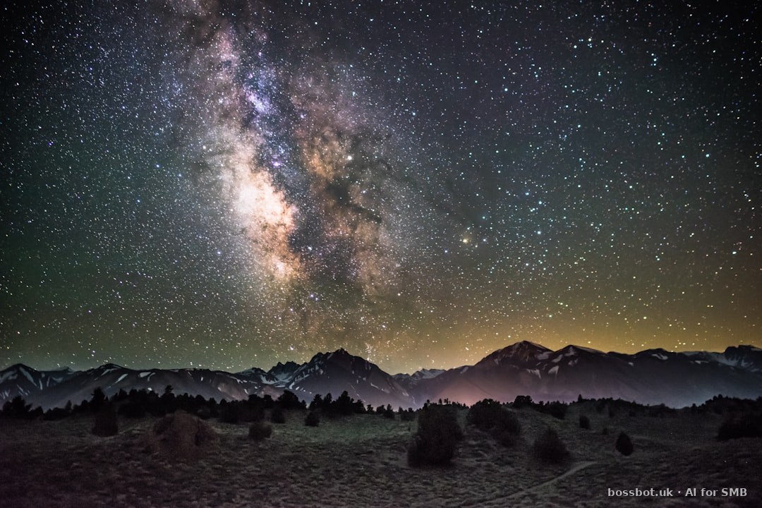Silhouette of mountains under milky way galaxy