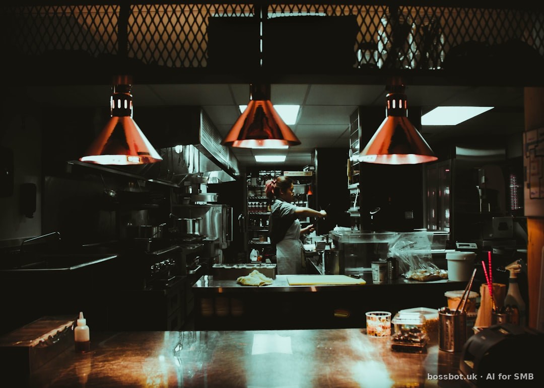 Woman standing near three red pendant lamps