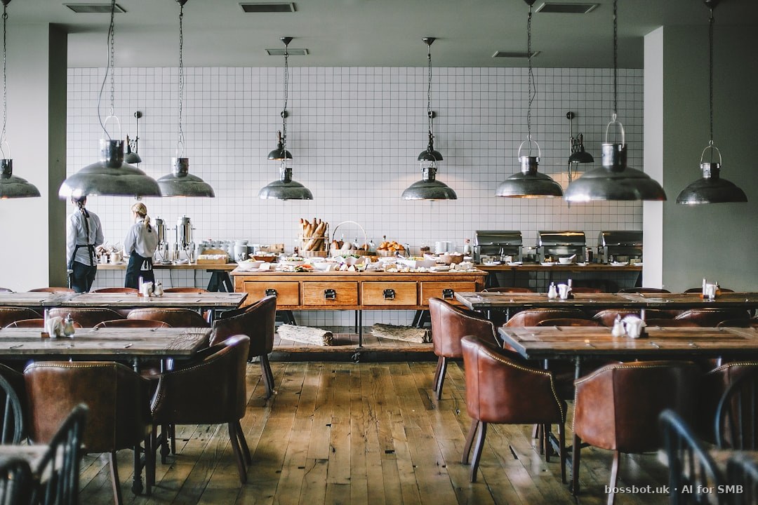 Restaurant CRM dashboard behind reservation desk