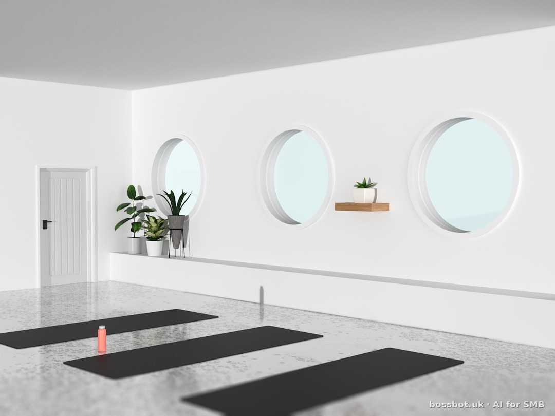 A room with three round windows and a potted plant